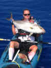 CA native Jon Schwartz shown here with a hard fighting Jack in Kona, HI