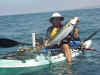 Johnny Ceviche posing with a nice yellow tail he caught in La Jolla, CA